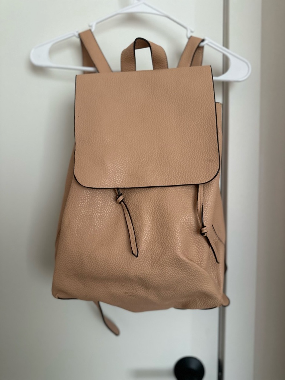 Pebbled Leather Drawstring Backpack in Beige
